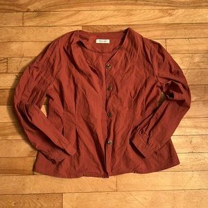 Terra cotta coloured blouse, size small, black label purchased at Simons